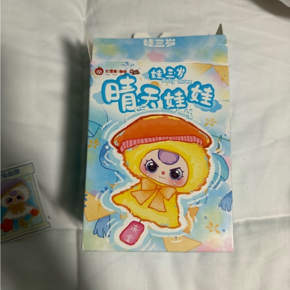 Baby Three “Sunny Baby” Limited Edition Plush Confirmed! Purple and Yellow hat.